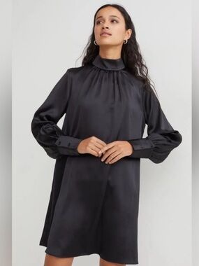Black satin long sleeve knee length dress flowy